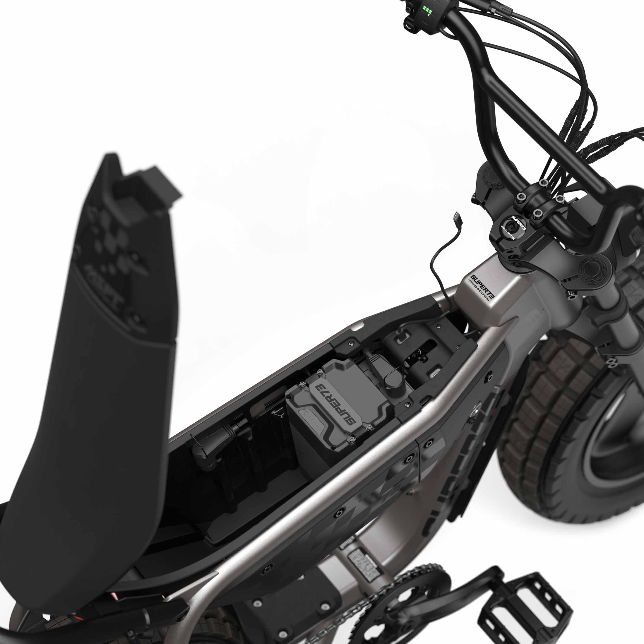 Top down view of the battery and in-seat storage on the SUPER73-MZFT ebike in Titanium Ore.