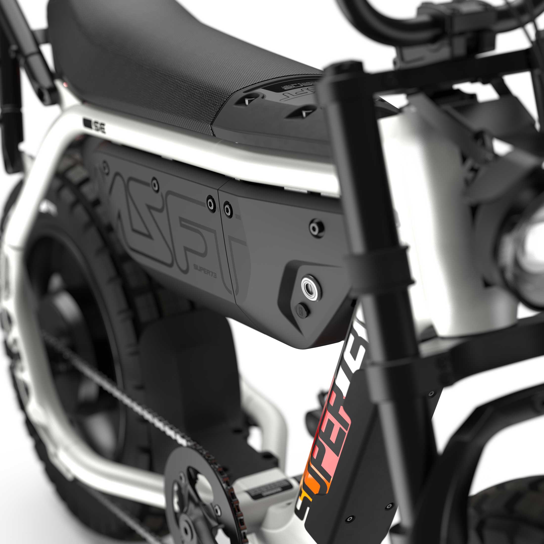 Close up of the seat and battery compartment with branded decals on the SUPER73-MZFT SE ebike in Baja.