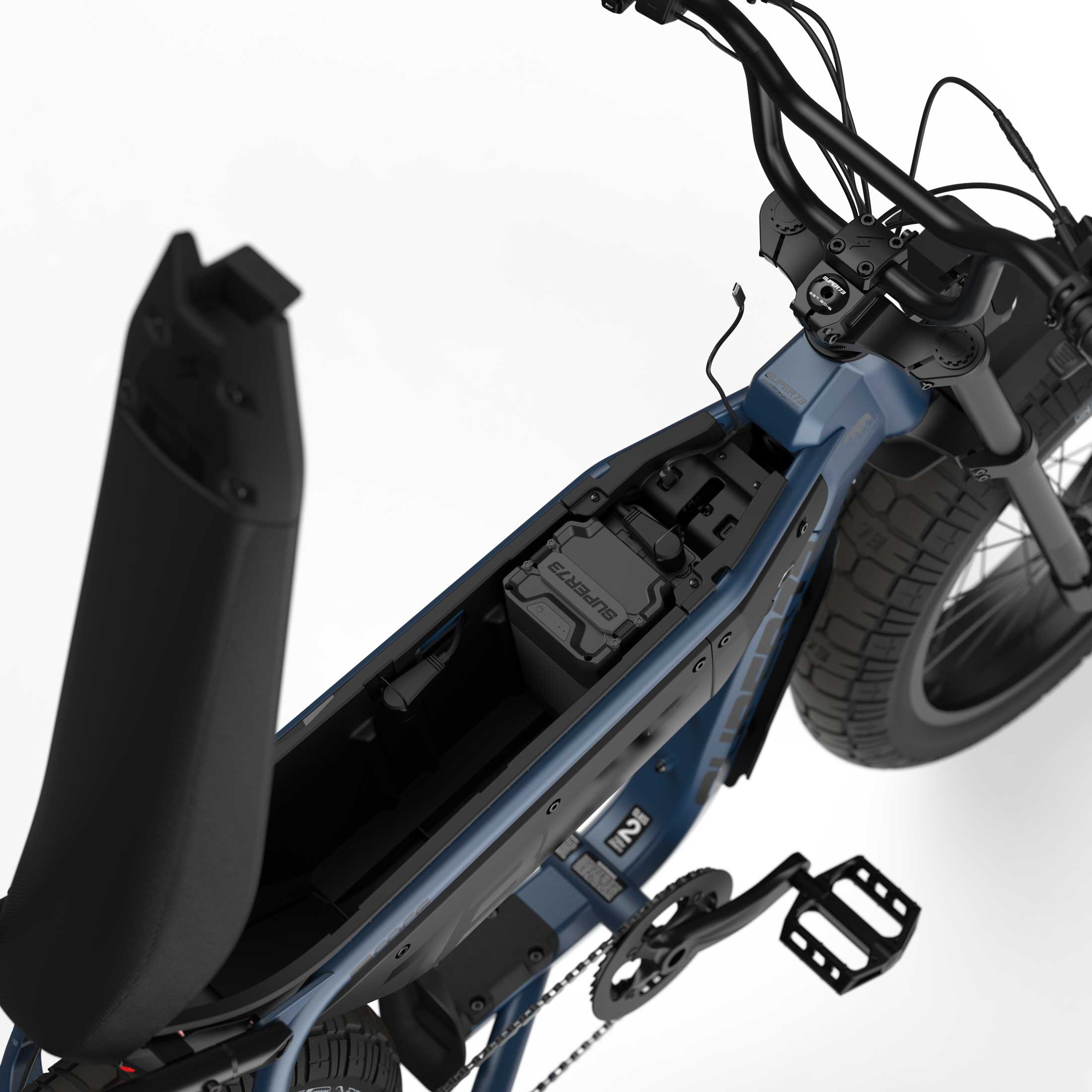 Top down view of the battery and in-seat storage on the SUPER73-M1D ebike in Slate.