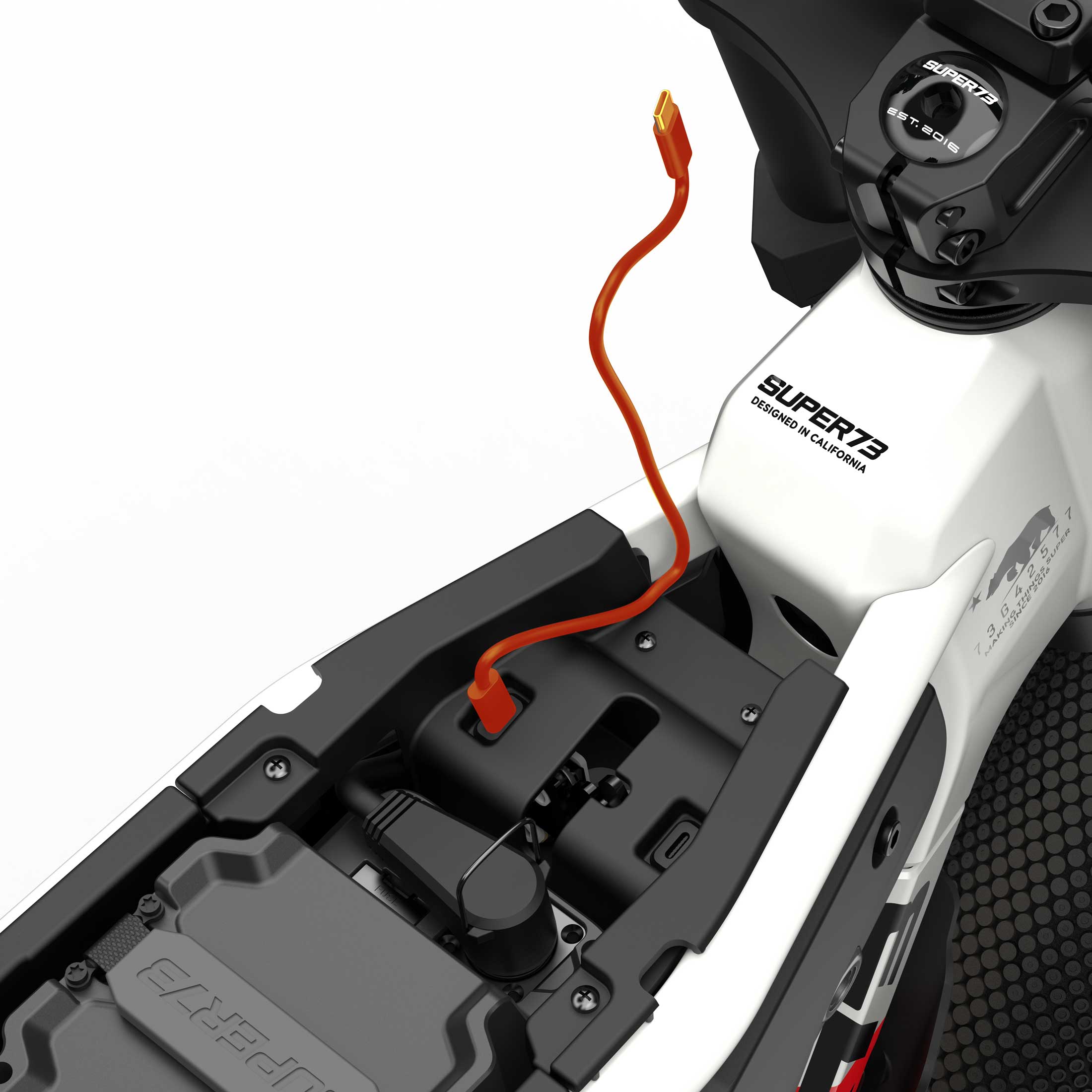 Close up of the USB-C charging port on the SUPER73-M1D SE ebike in Baja.