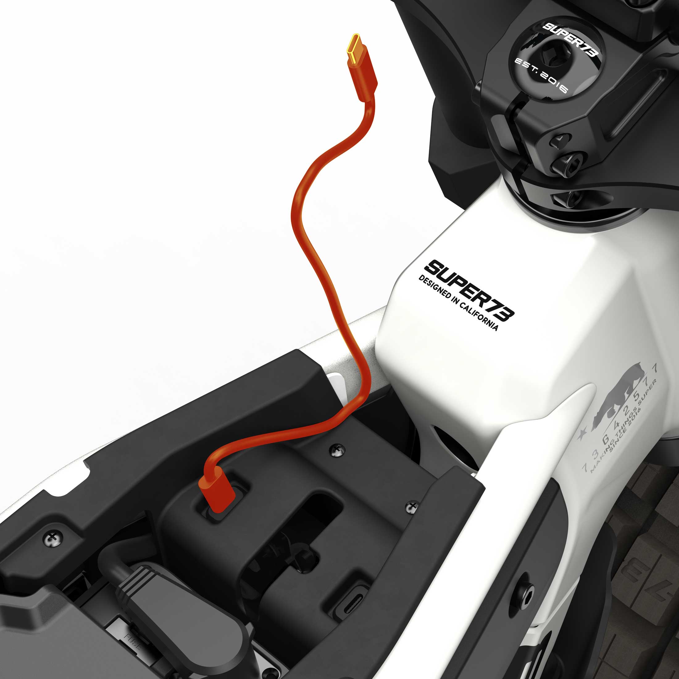 Close up of the USB-C charging port on the SUPER73-MZFT SE ebike in Baja.